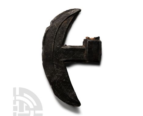 Circa 15th century A.D. With crosshatch pattern in relief on both sides, originally fitted to a small wooden shaft with trace