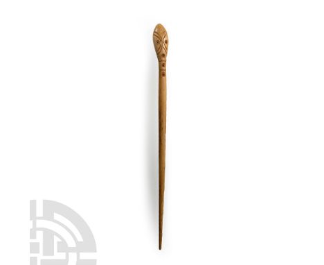 1st-4th century A.D. With tapering shank and bulb finial carved to represent a snake's head,  3.01 grams, 12.8 cm (5 in.). [N