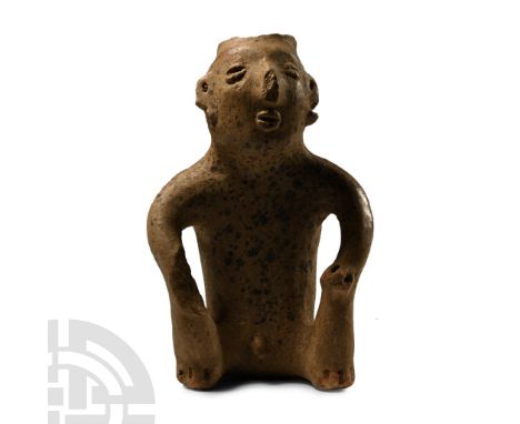 100 B.C.-250 A.D. Hollow-formed and modelled as a seated male with his hands on his knees; top of his head open with cup-shap