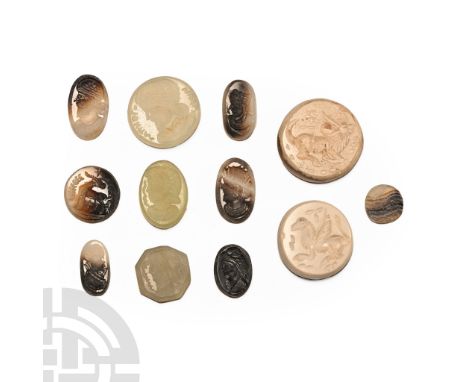 20th century AD. Mainly discoid and ellipsoid cloisons with intaglio designs including mythical beast, profile bust and other