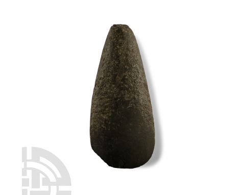 Neolithic Period, circa 4500 B.P. Teardrop-shaped with narrow butt, rounded sides and deep curved edge with polished blade, r