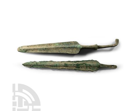 13th-11th century B.C. Comprising a tanged spearhead with heavily ridged and tapered blade, short collared shaft and square-s