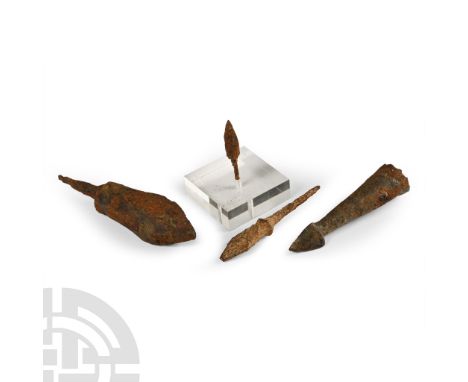12th-16th century A.D. Comprising a heavy quadrilateral bolt with short tang, two tanged arrowheads and one with a conical so