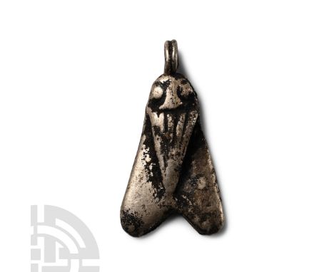 Late-Ptolemaic Period, 664-30 B.C. With linear detailing to wings, raised eyes, suspension loop above the head. Cf. Andrews, 