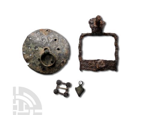 15th-18th century A.D. Comprising: a bronze lozenge-shaped brooch; an arrow-shaped bronze pendant; a discoid bronze ring fitt