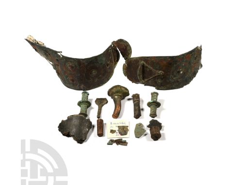 Iron Age, 1200-600 B.C. Including sections of rod with biconvex bulb, rod with flared base, repoussé sheet-bronze pectoral ba