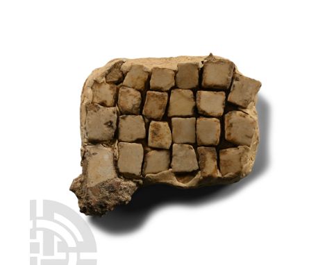 1st-4th century A.D. Group of roughly cuboid tesserae in modern matrix; note to underside 'Roman tesserae from mosaic floor, 