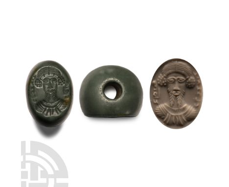 3rd-5th century A.D. Plano-convex in section with intaglio facing bust of a male with centre-parted hair and forked beard, na