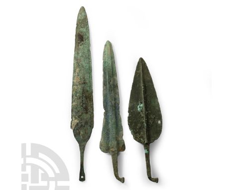 14th-10th century B.C. Tanged spearheads with foliate blades, one with accentuated midrib and bent tang, another with squared