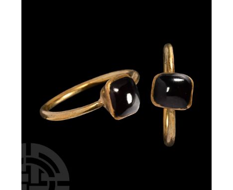 14th century A.D. With round-section hoop and inverted pyramidal cell, inset garnet cabochon. Cf. Chadour, A.B., Rings. The A