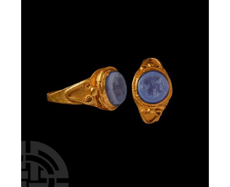1st century B.C.-1st century A.D. and later. Hoop with applied filigree and granules to the shoulders, inset later nicolo int