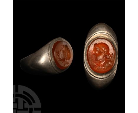 2nd-3rd century A.D. and later. With pointed angles to the plaque, stepped cell with inset later carnelian intaglio profile p