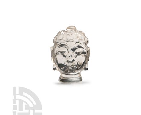 20th century A.D. Modelled in the round with ushnisha top-knot and flared base.  20.6 grams, 34 mm (1 3/8 in.). [No Reserve] 