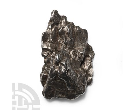 Fell 6000-5000 years B.P. A nickel-iron meteorite (IAB).  40.7 grams, 45 mm (1 3/4 in.). [No Reserve] From Chacoa, Argentina.