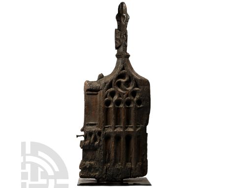 England, Norfolk or Suffolk, early 15th century A.D. Carved end of a church pew with lancet arch arcading supporting a rounde