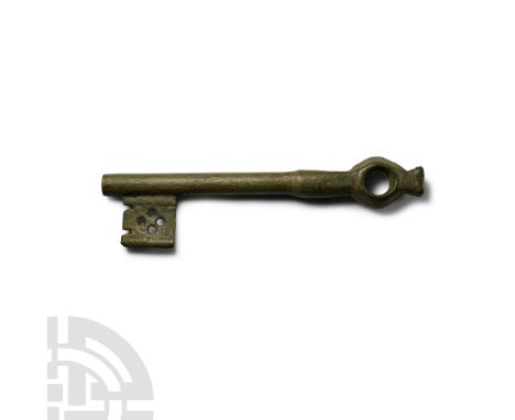 1st-3rd century A.D. With slender barrel, pierced bulb handle, square ward with four piercings and two bits to the forward ed