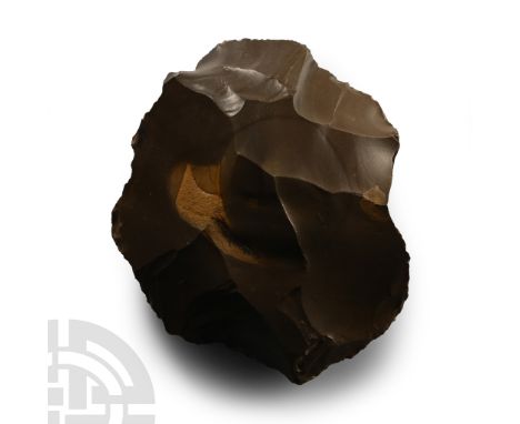 Lower Palaeolithic Period, 450,000-280,000 B.P. Lentoid in section with rounded cutting edge.  182 grams, 89 mm (3 1/2 in.). 