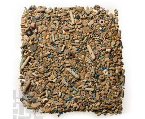 Late Period, 664-332 B.C. Including seed and tubular beads, and other items.  38 grams total, 1-14 mm (1/8 - 1/2 in.). [No Re