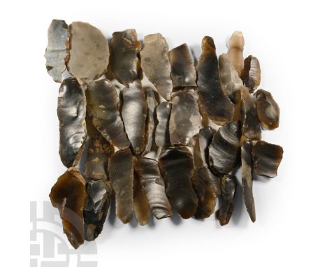 Neolithic Period, 6th-4th millennium B.P. Knapped two-edged blades and scrapers, some with cortex to one face.  226 grams tot