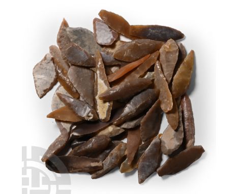 Neolithic Period, circa 6th-4th millennium B.P. Comprising mostly bifacial and uniface flint and chert arrowheads; probably f