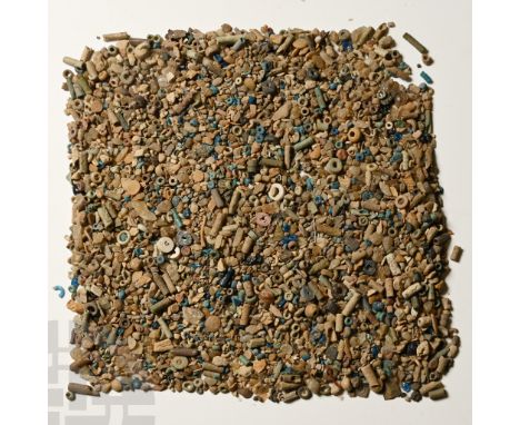Late Period, 664-332 B.C. Including seed and tubular beads, and other items.  46 grams total, 1-9 mm (1/8 - 3/8 in.). [No Res