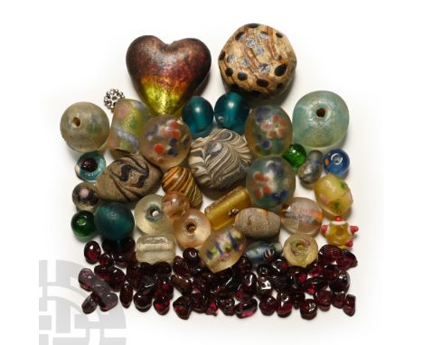 18th-19th century A.D. Including tabular, cylindrical, fusiform and other types.  83 grams total, 4-23 mm (1/8 - 7/8 in.). [9