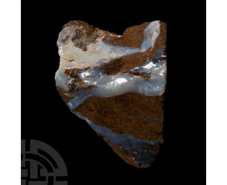 The matrix showing pale sky-blue opal, collection number 425, with an old James Walker label.  34.8 grams, 39 mm (1 1/2 in.).