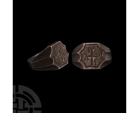 15th-17th century A.D. With fluted shoulders and scooped edges to the bezel, pointillé border and Greek monogram of a cross w