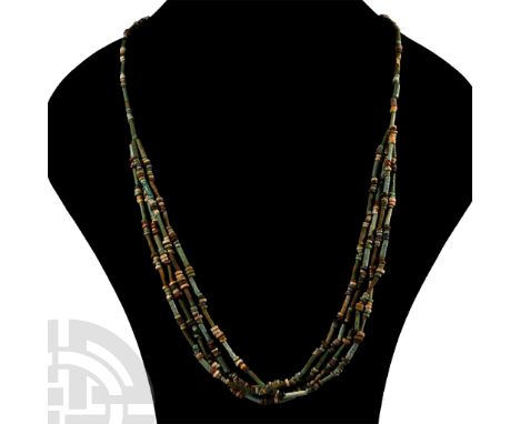Late Period, 664-332 B.C. Multi-stranded designer necklace composed of beads of mainly annular and cylindrical types. Cf. sim