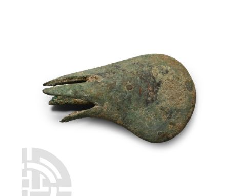 2nd-1st millennium B.C. Comma-shaped in plan with a lentoid-section head and clawed socket.  89 grams, 73 mm (2 7/8 in.). [No
