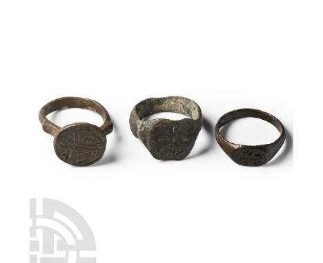 15th-16th century A.D. Comprising three rings: one with a D-section hoop and intaglio image of a beast facing back; one with 