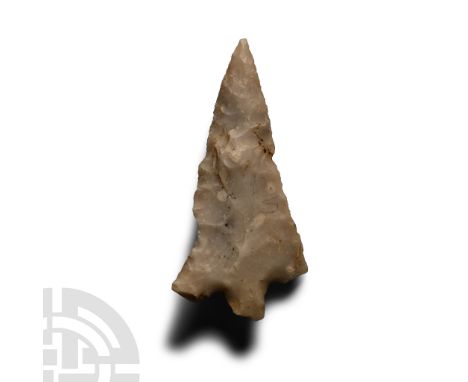 Neolithic-Early Bronze Age Period, circa 2nd-1st millennium B.P. Plano-convex in section and triangular in plan with short ta
