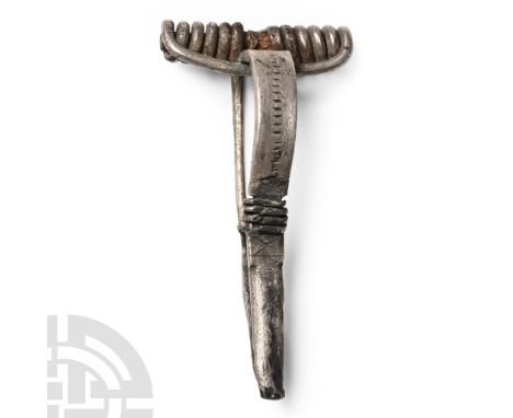 2nd-3rd century A.D. P-shaped bow brooch comprising a deep bow with rouletted ornament, chord and integral spring, incised sa