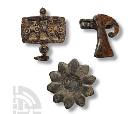 1st-2nd century A.D. Comprising: rosette with central cell, pin to reverse; P-shaped plate with spring and pin; rectangular p