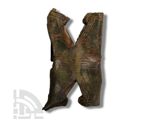 2nd century A.D. Bronze fitting with repoussé rings and low-relief lines to rim, folded to fit onto a scabbard. Cf. Miks, C.,