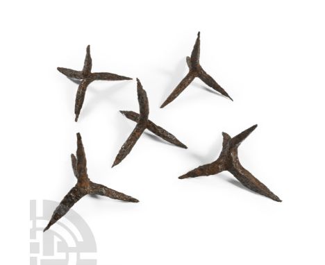 13th-14th century A.D. Each hand-forged with square-section spikes, designed so that however the item falls, one spike is alw