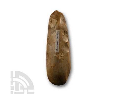 Neolithic Period, circa 6000 B.P. Scaphoid in section with irregular rounded butt and curved edge, polished; old find spot la