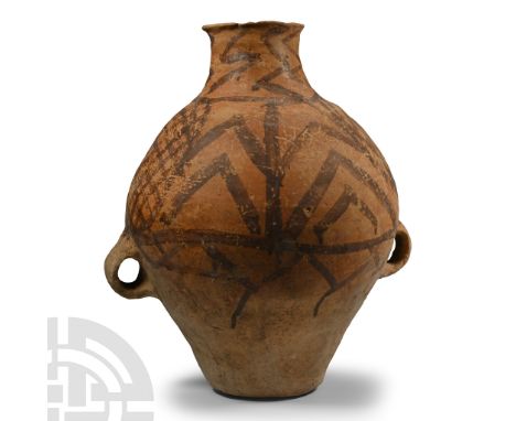 Neolithic Period, 3rd millennium B.C. Piriform bodied and painted with two netted roundels to the upper body; two loop handle