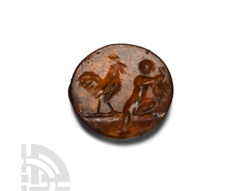 2nd-3rd century A.D. Translucent with gently sloping walls, intaglio image of a rooster facing a seated Cupid, his upper body