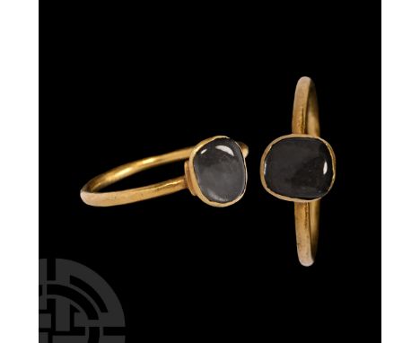 14th century A.D. Round-section hoop supporting a conical cell with inset rock crystal cabochon. Cf. Chadour, A.B., Rings. Th