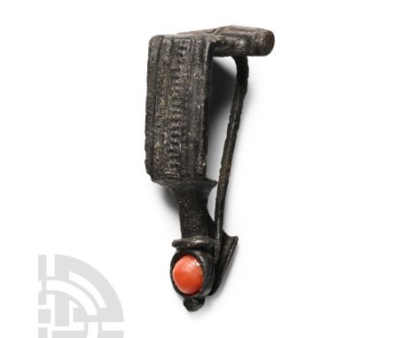 1st century A.D. Of Hod Hill type with hinged pin, vertical flat bow with fluting and median textured band, waisted shank and