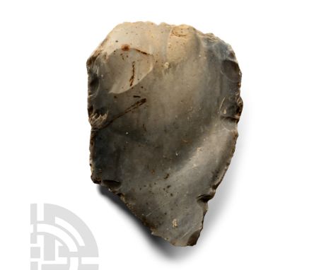 Neolithic Period, 4th-2nd millennium B.P. Triangular in plan with scooped point, cortex to one face.  223 grams, 12.2 cm (4 3