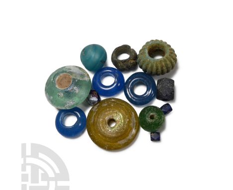 Circa 1st-2nd century A.D. Including annular, melon, polyhedral and other bead types.  39 grams total, 4-26 mm (1/8 - 1 in.).
