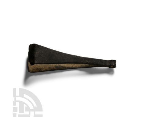 6th-8th century A.D. With tapering arms and inturned blades. Cf. MacGregor, A. &amp; Bolick, E., A Summary Catalogue of the A