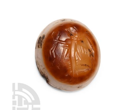 1st-2nd century A.D. Cabochon with engraved intaglio of Victory standing with wings spread to the rear, one arm extended hold