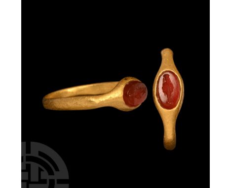 2nd-3rd century A.D. Slender hoop with sharp shoulders, inset carnelian gemstone with intaglio Artemis motif. Cf. Chadour, A.