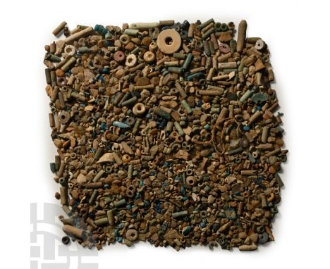Late Period, 664-332 B.C. Including seed and tubular beads, and other items.  35 grams total, 1-14 mm (1/8 - 1/2 in.). [No Re