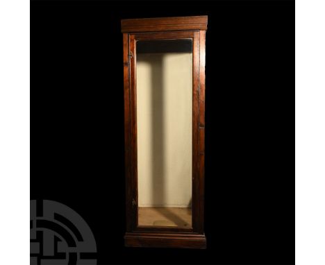 Large Vintage Oak Display Cabinet. Mid 20th century A.D. A large wood cabinet glazed on three sides for the display of a suit