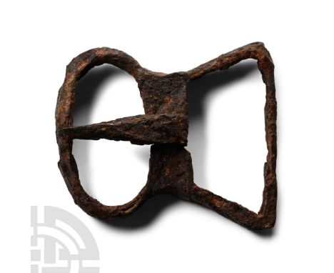 Circa 2nd century A.D. With rectangular frame and kidney-shaped loop broad crossbar with waisted scentre and coiled tongue.  
