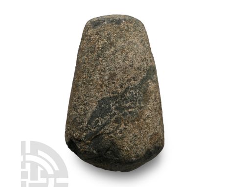 Neolithic Period, circa 4000-2300 B.P. A complete ground axehead sub-ovate in plan, narrower at the butt end with a rounded c